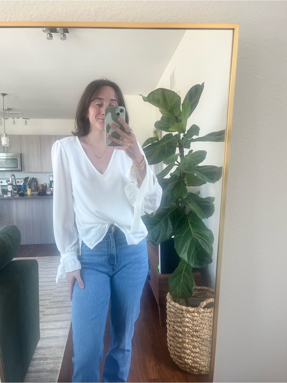 CeCe White V-Neck Long Sleeve Ruffle Cuff Blouse